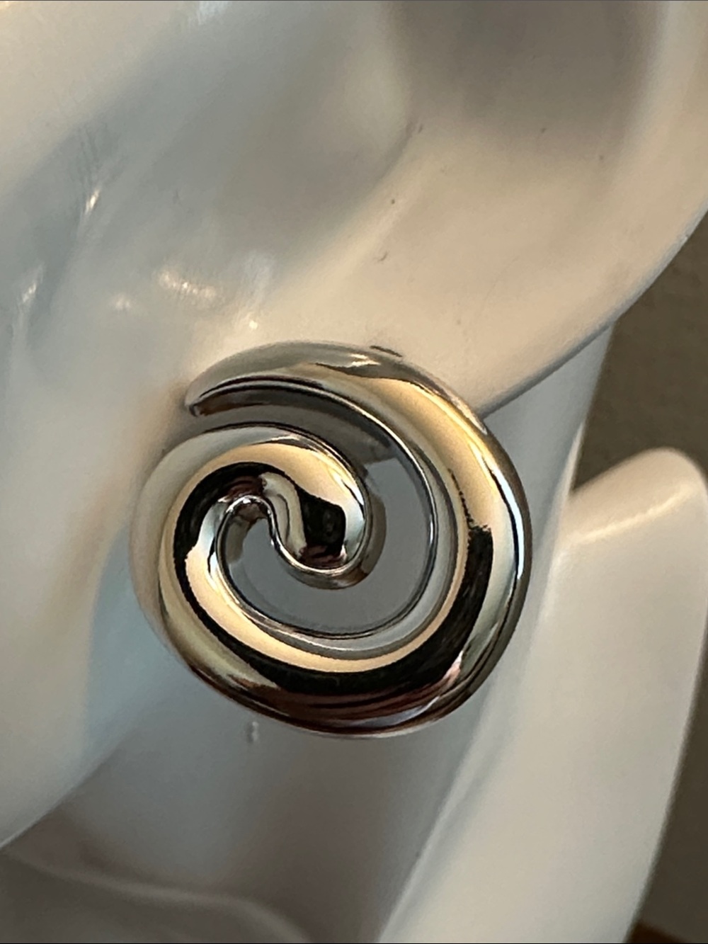 Polished Spiral Stud Earrings in Silver Tone - Picture 2 of 8